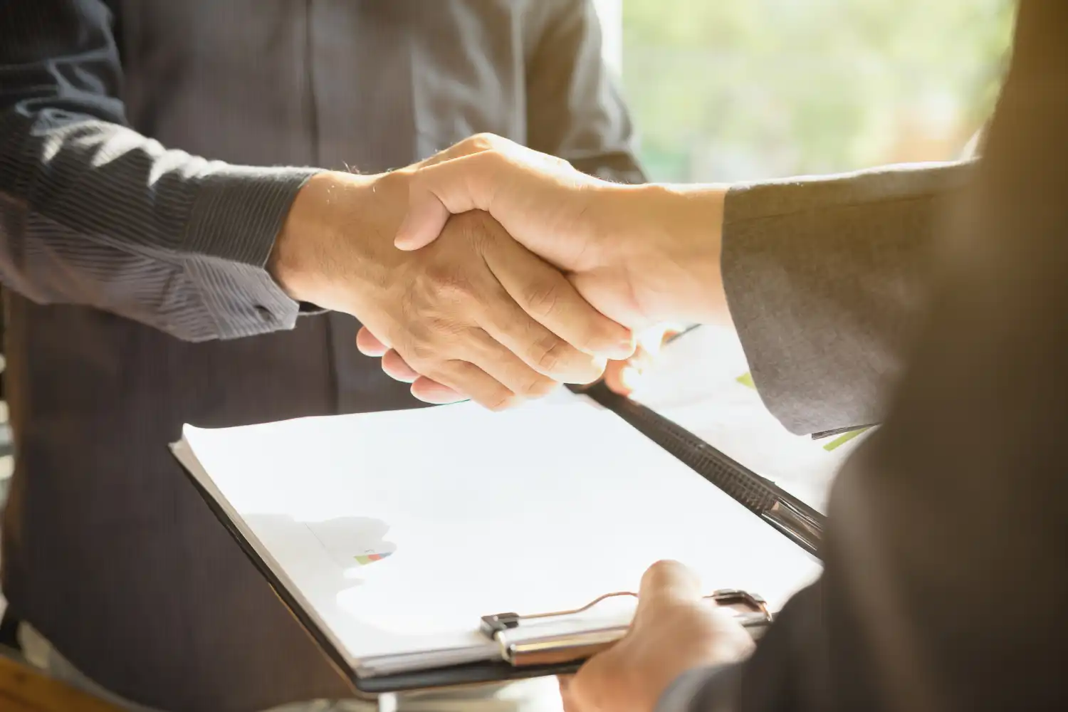 Bridging loan application process drawdown — borrower signing bridging loan legal checks and offer documents before funds release with solicitor